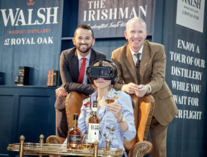 Tracey Jordan, ARI, enjoying the Walsh Whiskey Distillery virtual tour at Dublin Airport alongside Bernard Walsh, MD, and Shane Fitzharris, Head of Sales, Walsh Whiskey Distillery